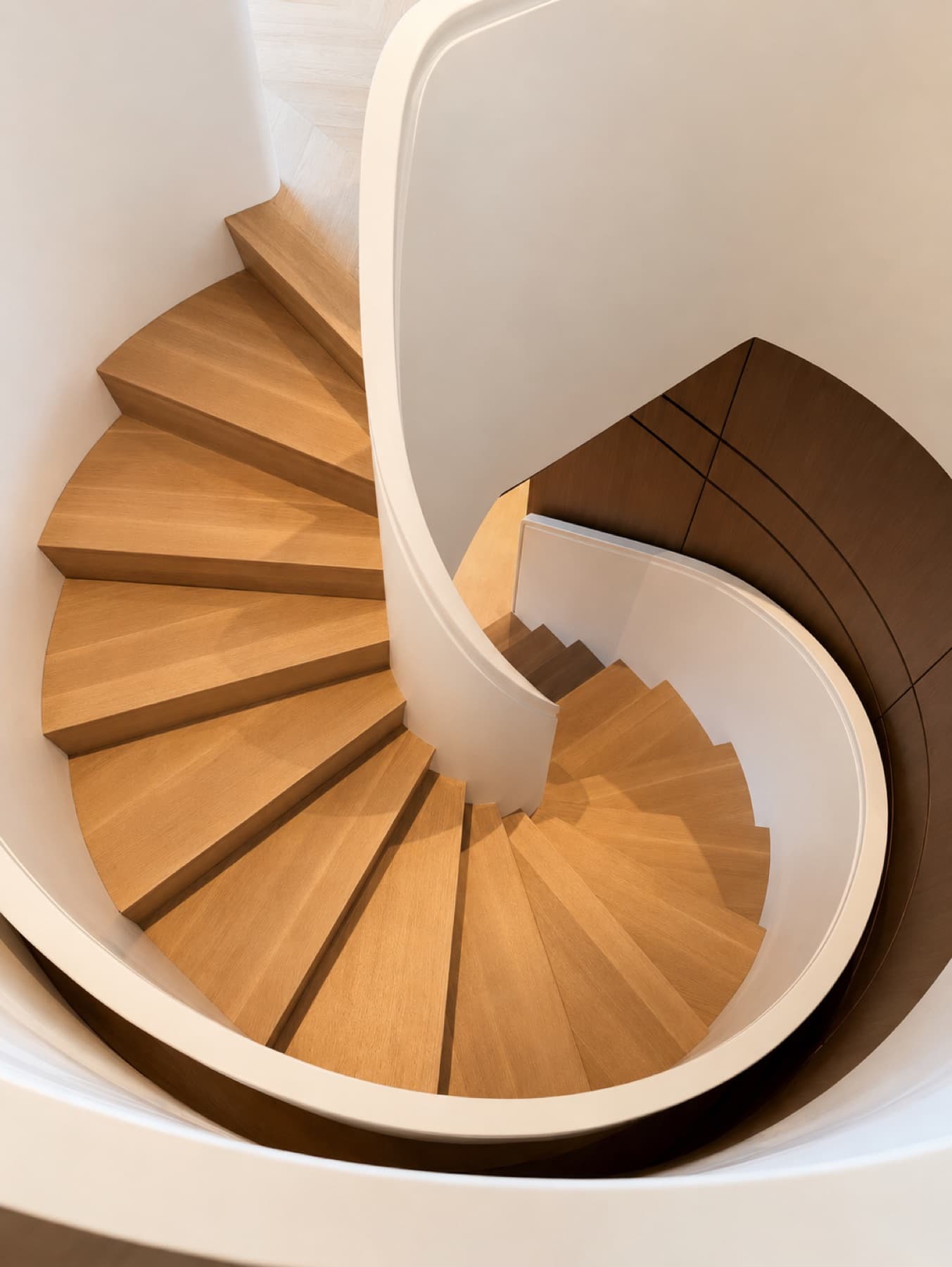 Sculpting the Stair: A Curved Corian Staircase for a Private New York Residence